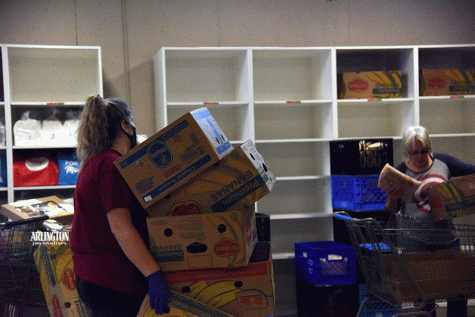 Volunteers work at the Arlington Community Food Bank in early October.