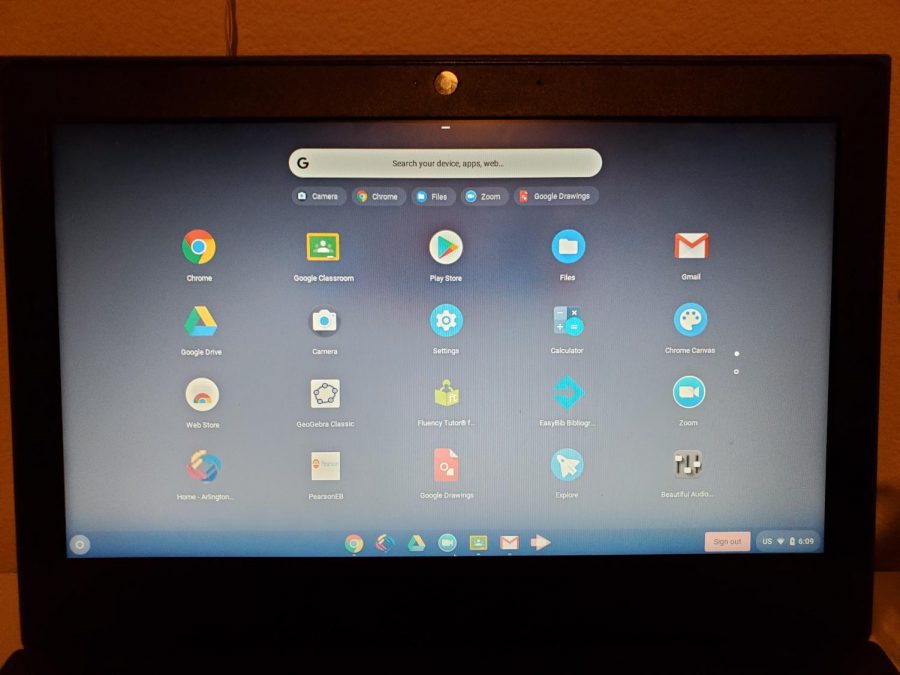 This is a picture of a school provided  chrome book and its screen. 