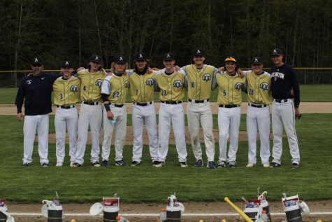 It was senior night for Varsity Baseball! Coaches line up with the eight senior players before they take on Stanwood. 