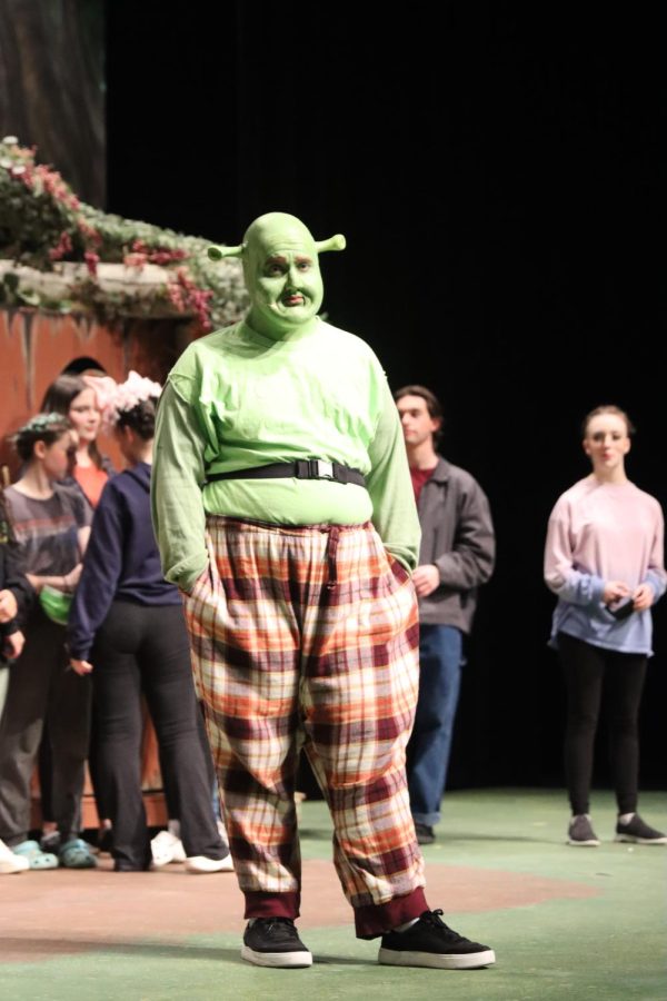 Will Litton is seen as Shrek in the Shrek the Musical play on Mar. 4, 2022. 