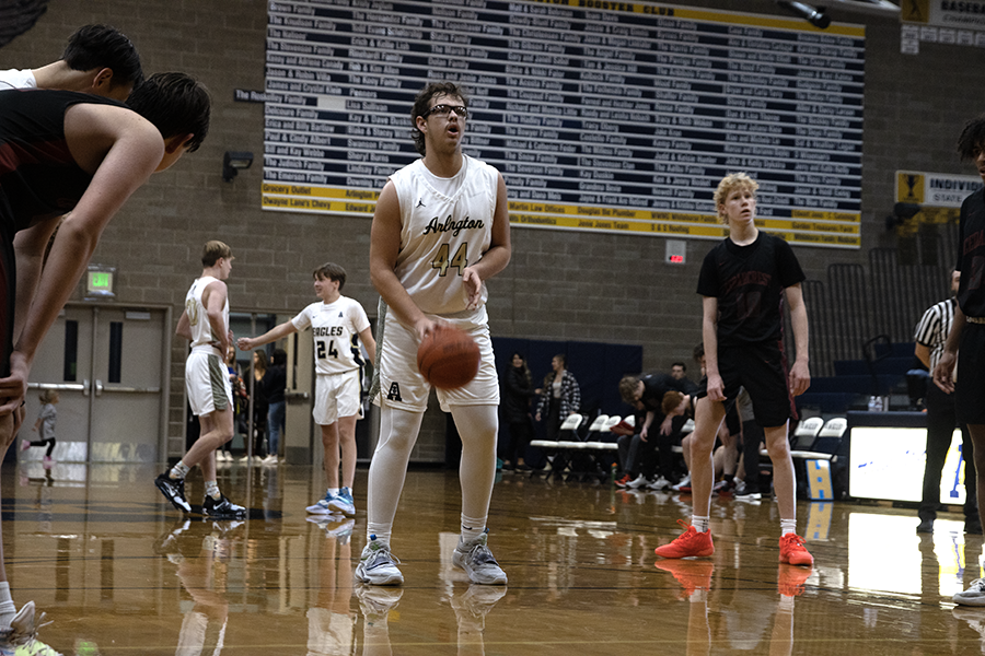 Sophomore Billy Kooy setting up for a free throw in the Dec 7 game against Cedarcrest