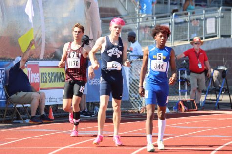 Junior Dallas Miller competed in the 400m dash. Also pictured are Lincoln sophomore Julian Starns and Hazen freshman Kenyon Andrews.