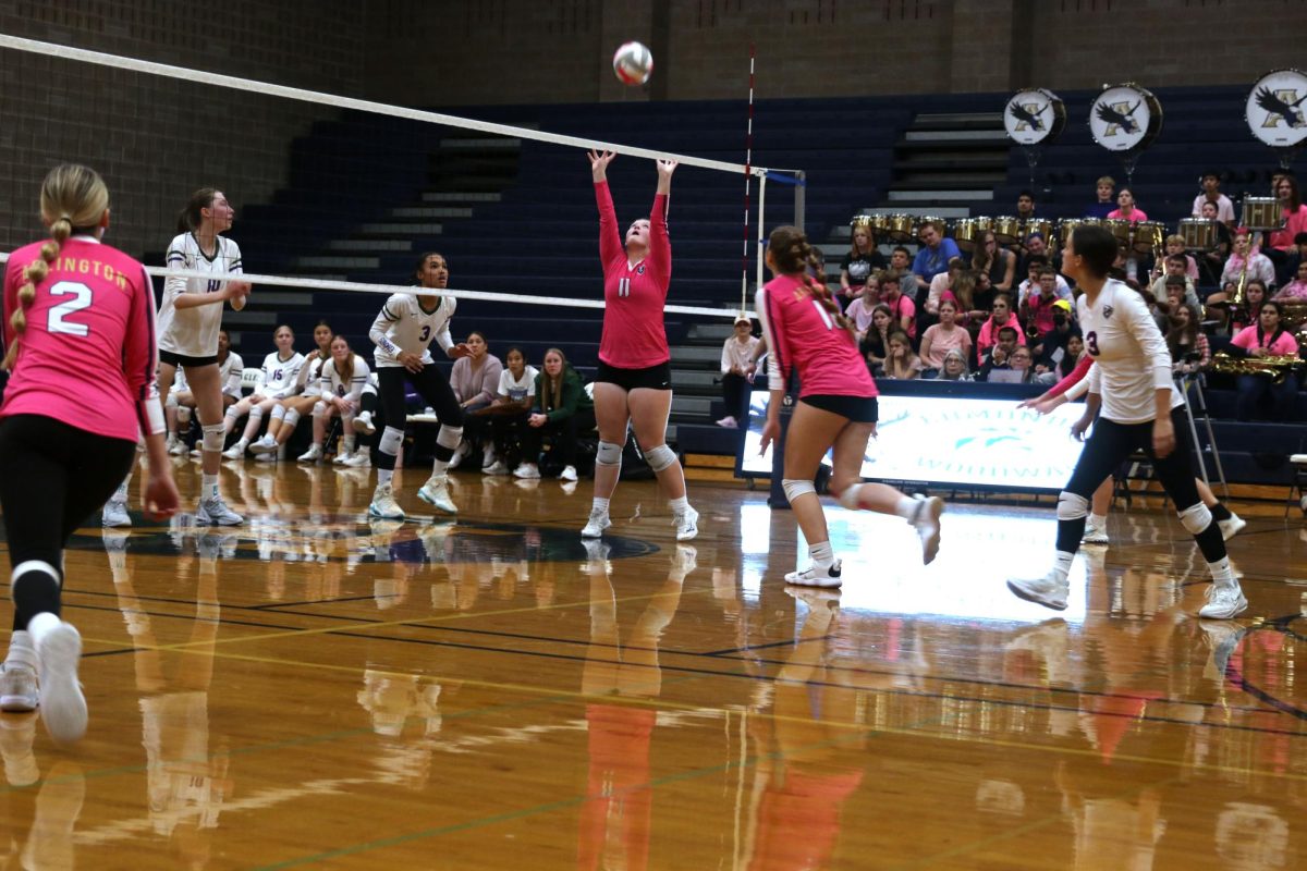 During the Pink Out game, Audrey Marsh (‘26) sets for another player’s attack. “Audrey Marsh is about to set someone for the kill for a final point” said Delanie Theuret (‘24).