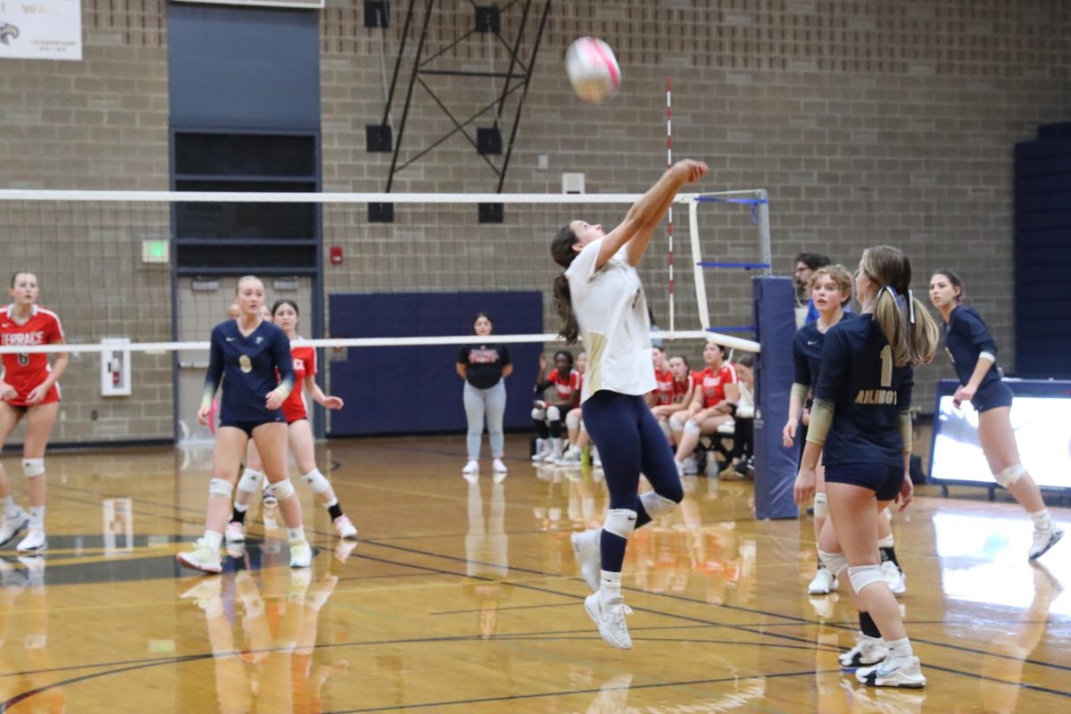 Libero, Savannah Roberts ('23), goes for a bump. Senior night game on 10/23 of Arlington v.s Mountlake Terrace with a final score of 3-0. "I was running after the ball to save the point on senior night" said Roberts.
