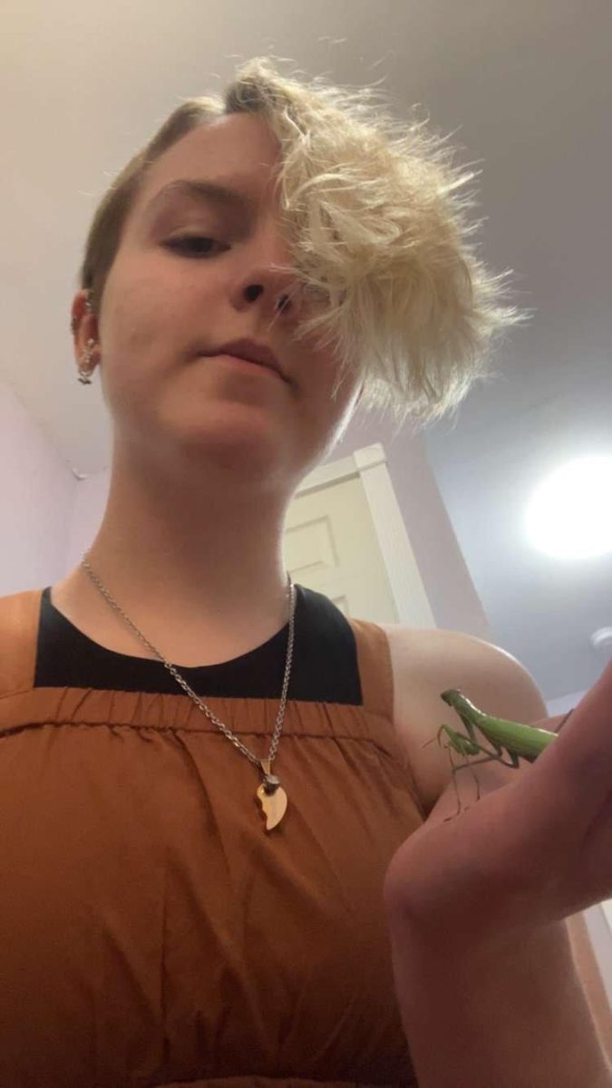 Holding a male praying mantis, Addison Martin (‘27) shows off her interest in animals and insects and her love for them, too.

