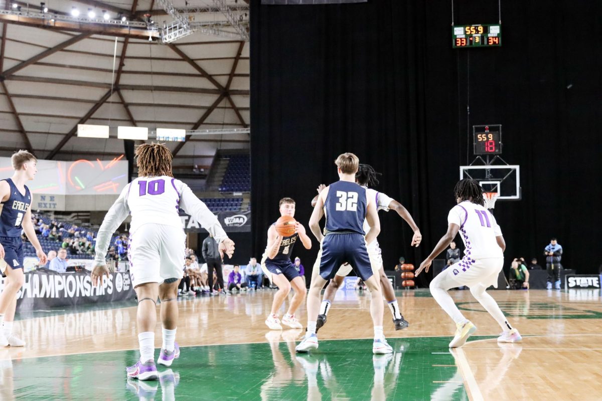 Stepping up to the line, Senior Jacoby Falor loads up for his 3 pointer. His goal was to, “just hit shots because its hard to shoot in the Tacoma Dome.” Throughout the season he was a go to sharp shooter from the 3-point line for the eagles. Falor was asked about working with his teammates, and referred to Leyton Martin as, “that guy,” when asked about his go-to player.