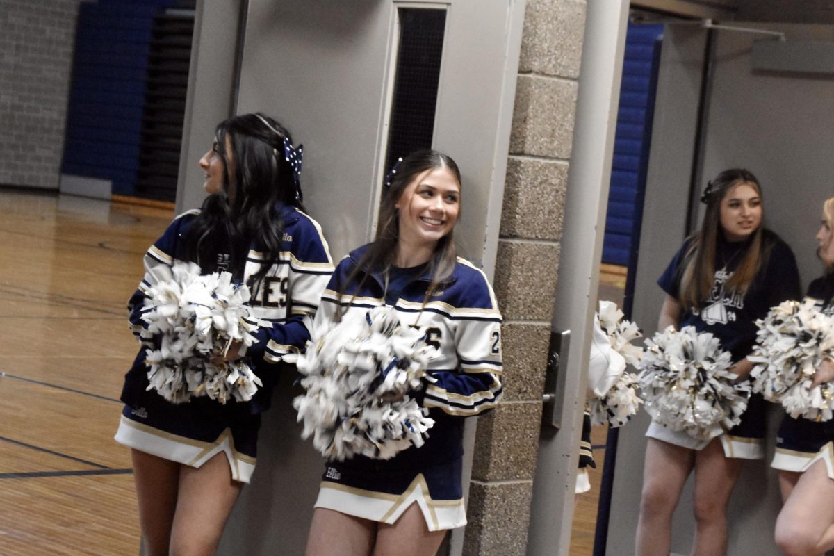 During future freshman night, a handful of cheerleaders wait at the doors for students to come in. Bella Matthews (‘24) and Ellie Lehman (‘25) were excitedly waiting for permission to let the freshmen in. “We were waiting for the OK for them to all come in,” Ellie Lehman said.