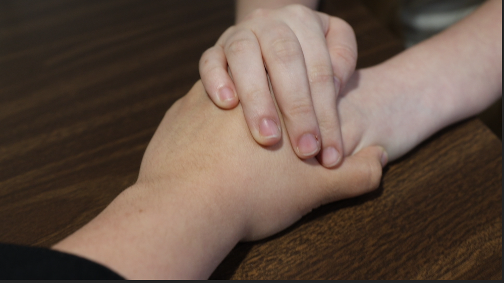 A comforting gesture.