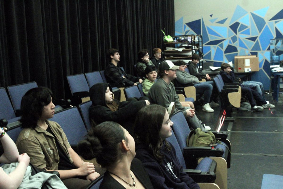 Senior Ian Boyd, and his beginning theatre classmates, are talking about 12 Angry Men in class.