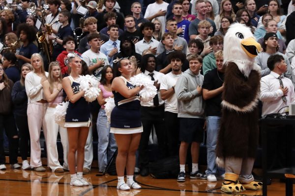 The senior section at the Welcome Back Assembly on September 11. Assemblies always start with the playing or singing of the National Anthem. 