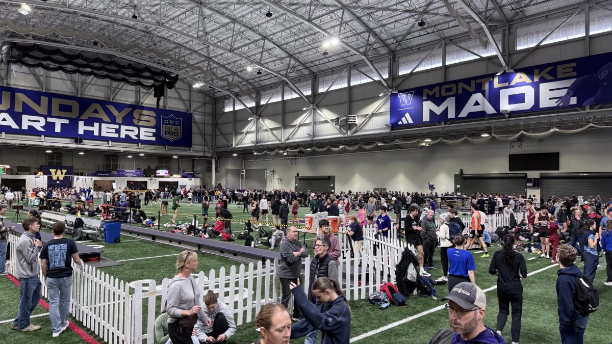 01/31/26 Spectators and athletes at UW Mile City Dempsey indoor facility.