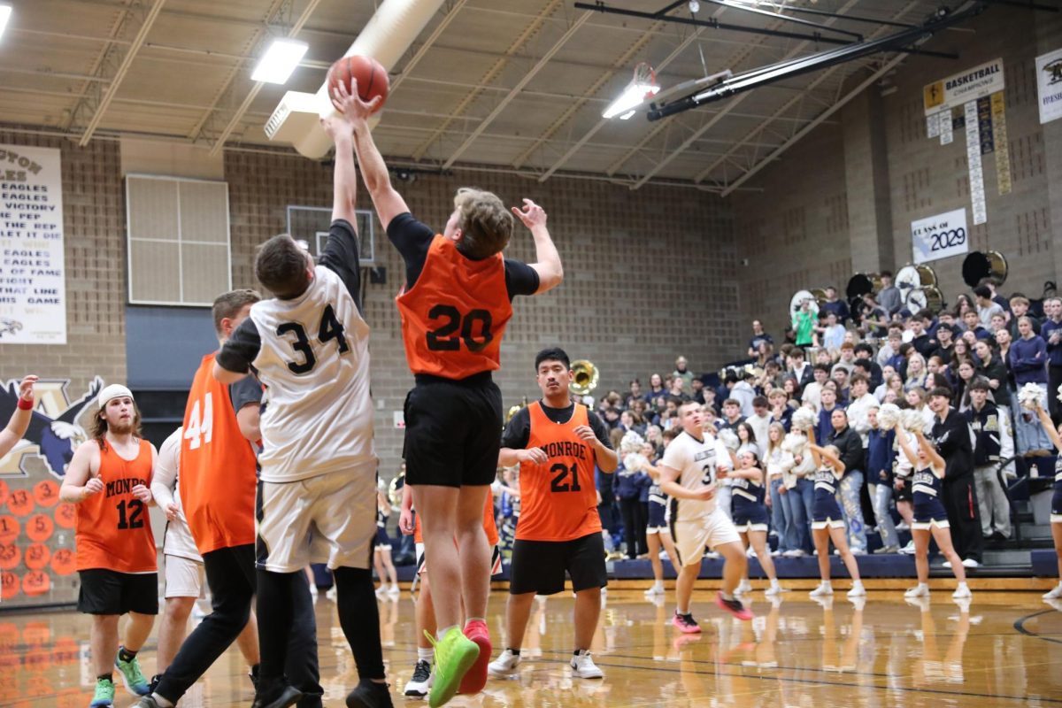 Wyatt Honsowetz attempts to get the rebound at the Unified Pack the Gym Basketball game. 
