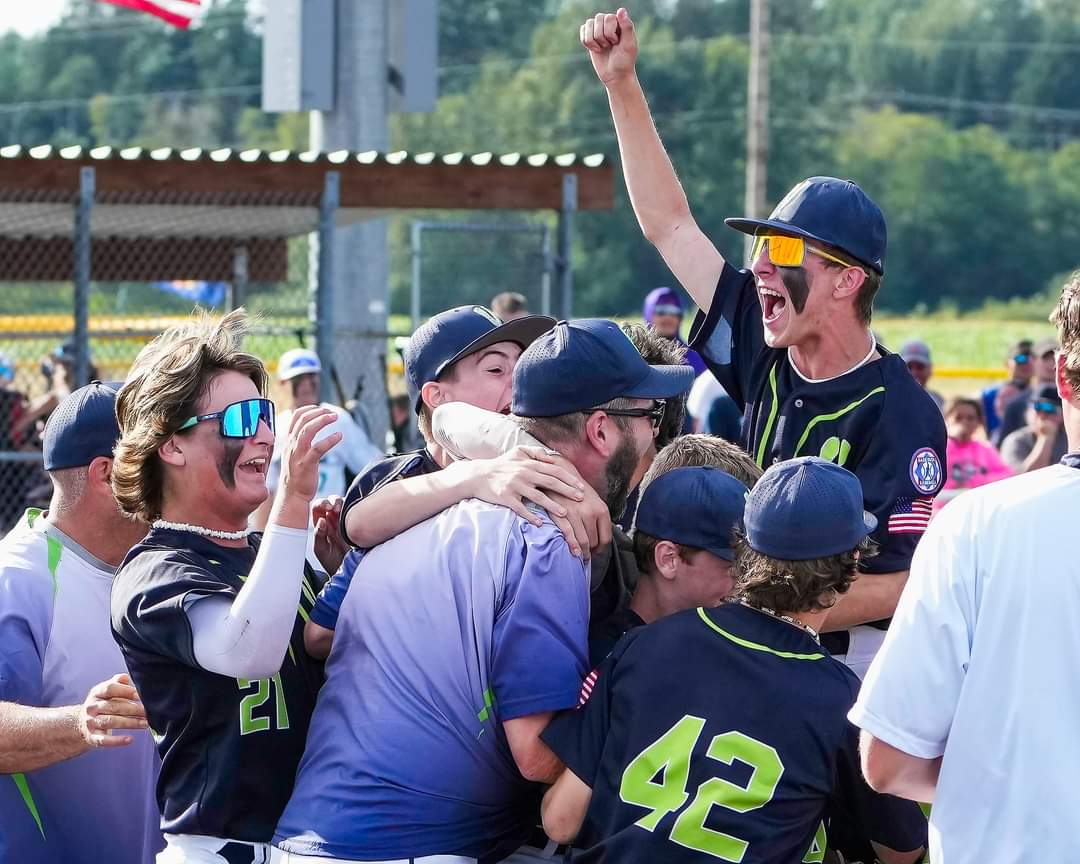 Baseball players celebrating a victory after a long, hard fought journey