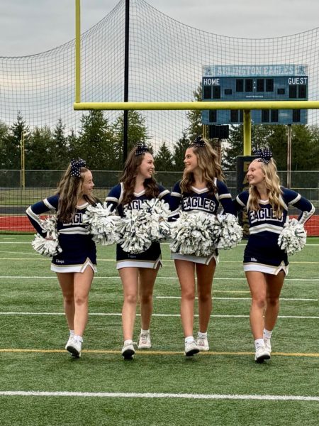 Chayse Hall, Tegan Morice, Naomi Bleken, Adalyn Haller in their cheer uniform 