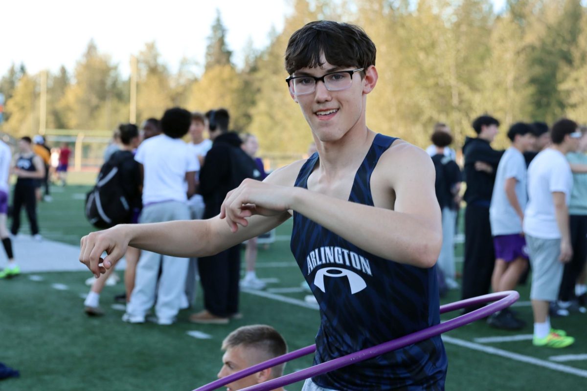 Before everything but the baton relay, Christopher Bydalek(12) is spinning a hula hoop. During the meet, he focused on his form and had a goal to set a personal record. “I like to close my eyes and think about my form and what I’m looking like going through the race,” Bydalek said.